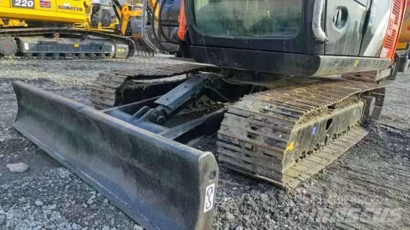 Hitachi ZX 60 Гусеничні екскаватори