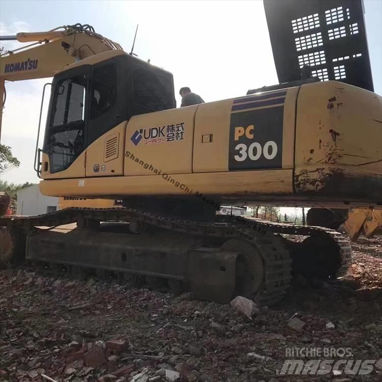 Komatsu 300 Гусеничні екскаватори