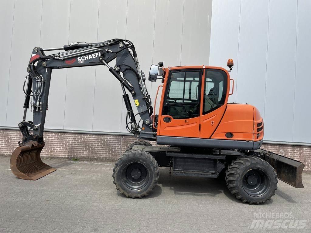 Schaeff TW110 Середні екскаватори 7т. - 12т.