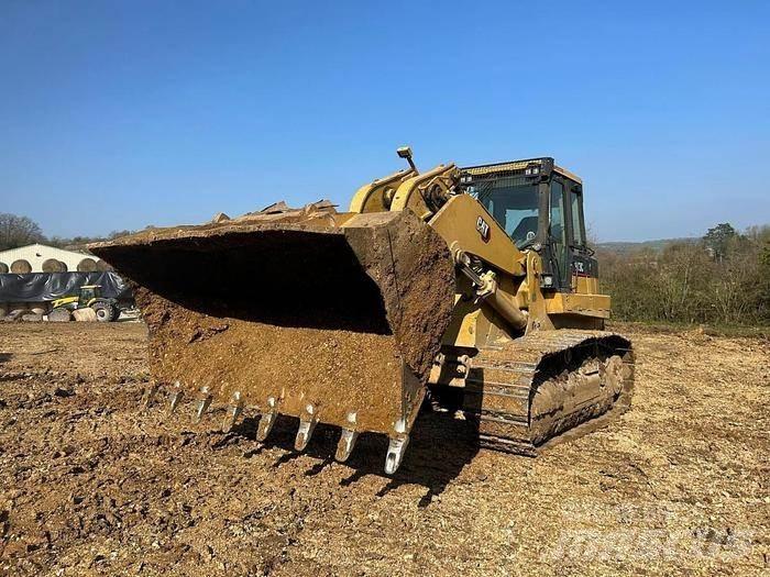 CAT 973C - Спеціальні екскаватори