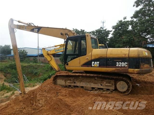 CAT 320 C Екскаватори з великим вилітом