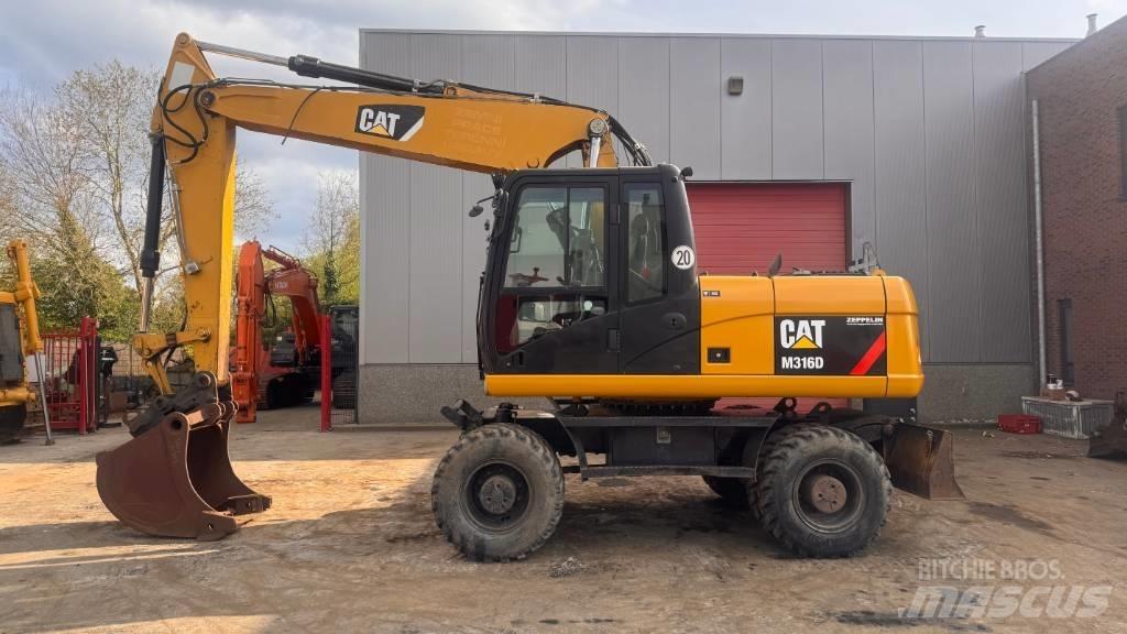 CAT M 316 D Колісні екскаватори