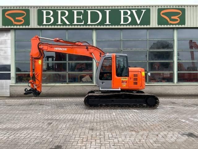 Hitachi ZX 135 US Гусеничні екскаватори