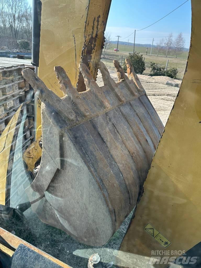 CAT 442E Екскаватори-навантажувачі