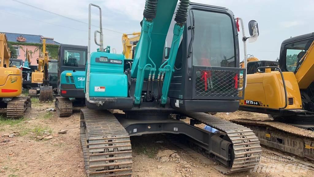 Kobelco SK 140 Гусеничні екскаватори
