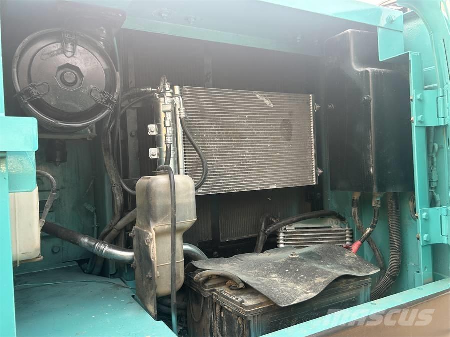 Kobelco SK 140 Гусеничні екскаватори