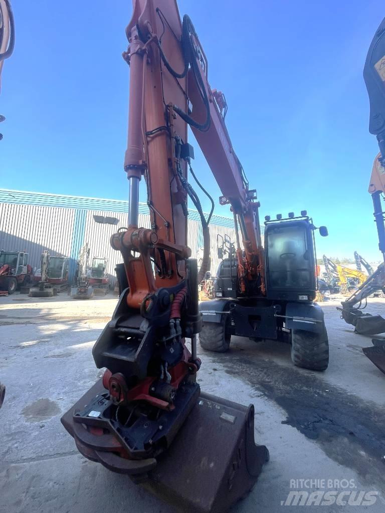 Hitachi 140W-6 Колісні екскаватори