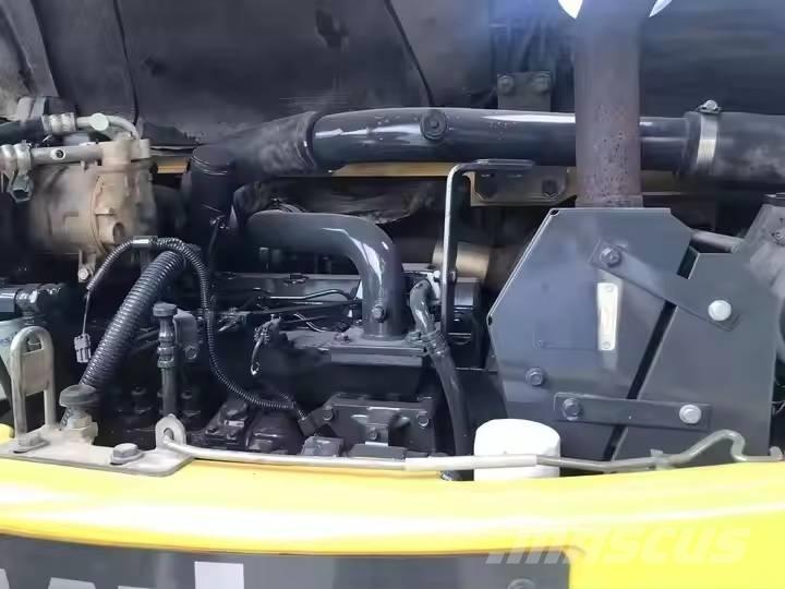 Komatsu PC78US Середні екскаватори 7т. - 12т.