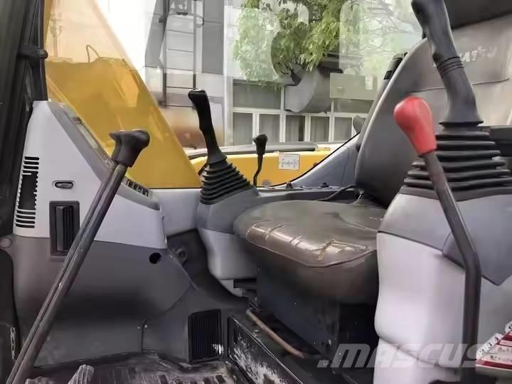 Komatsu PC78US Середні екскаватори 7т. - 12т.