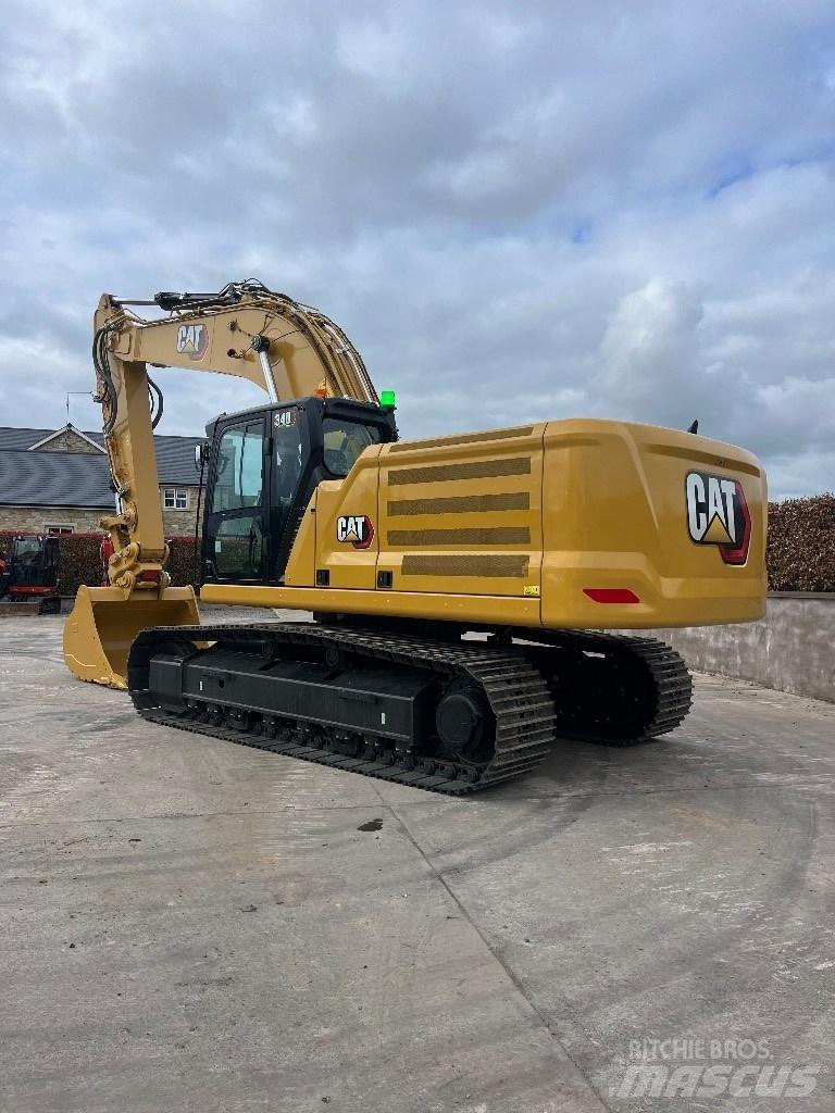 CAT 340 Гусеничні екскаватори