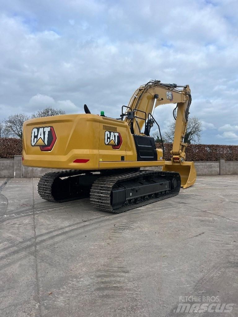 CAT 340 Гусеничні екскаватори