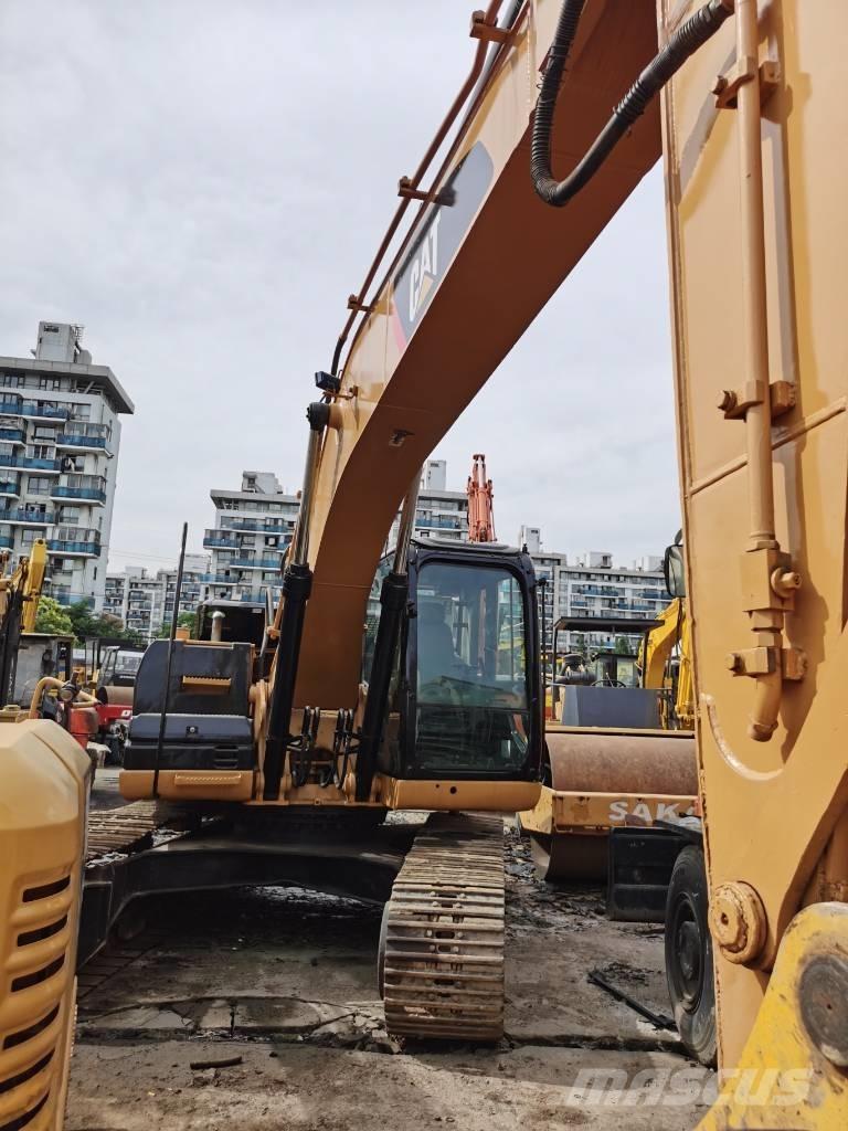 CAT 323D Гусеничні екскаватори
