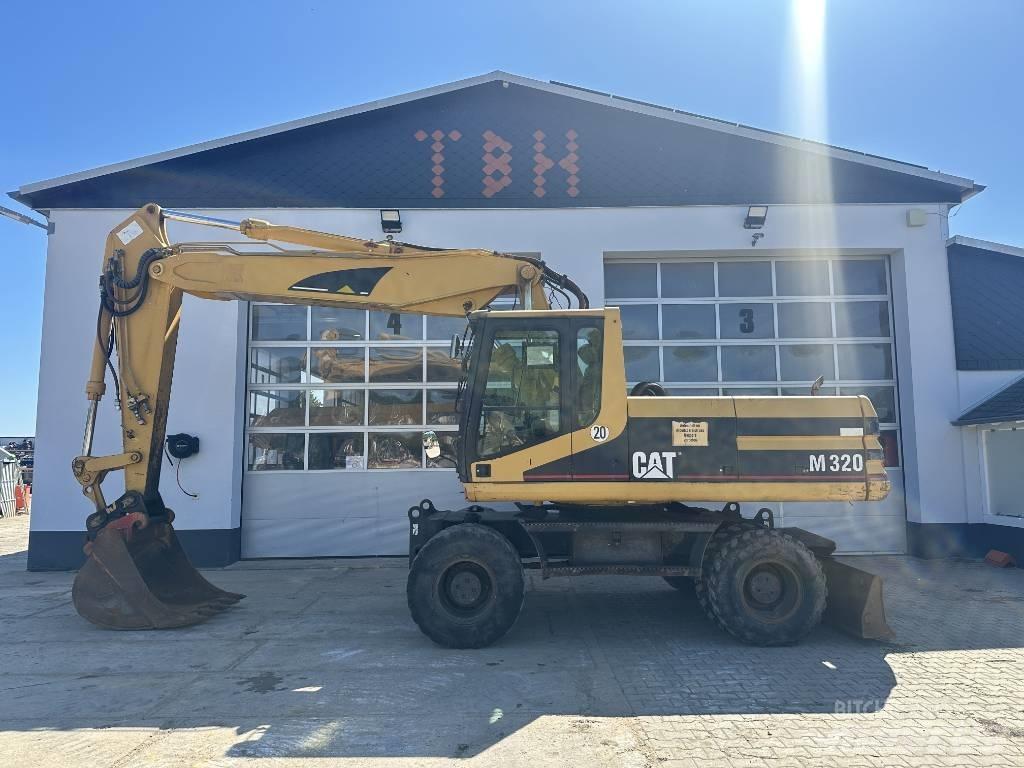 CAT M 320 VAH Колісні екскаватори