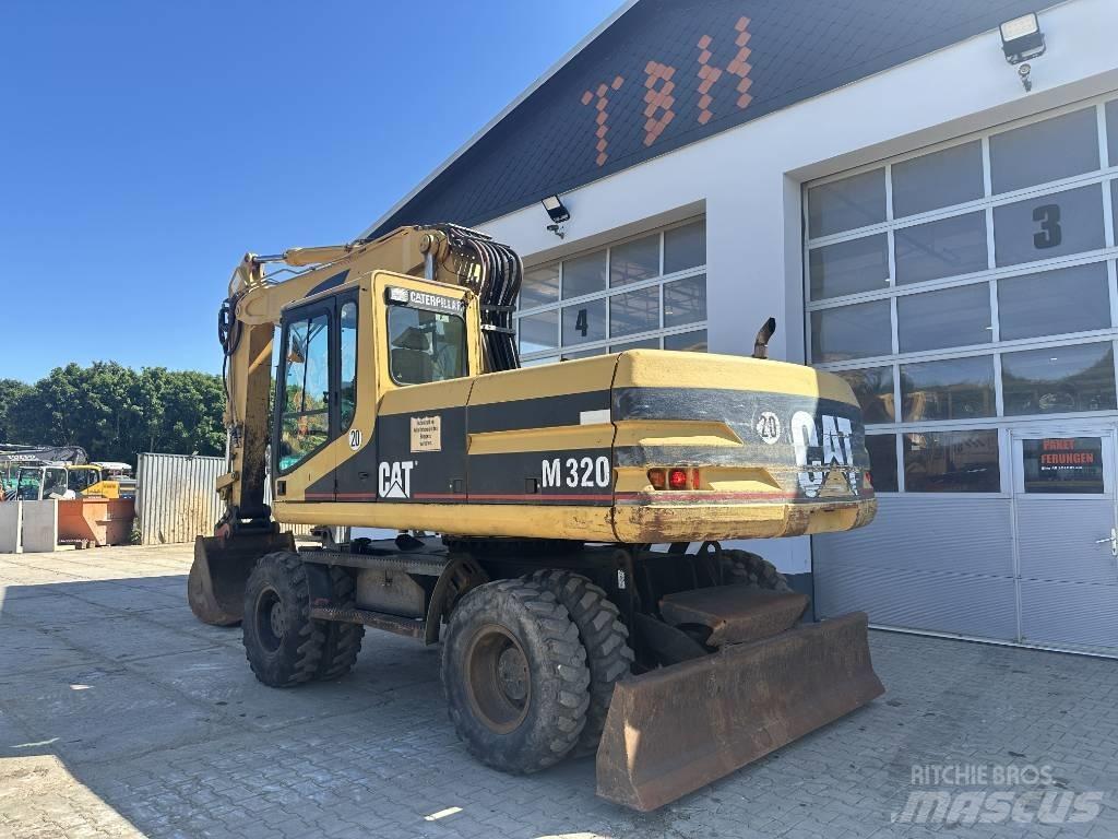CAT M 320 VAH Колісні екскаватори
