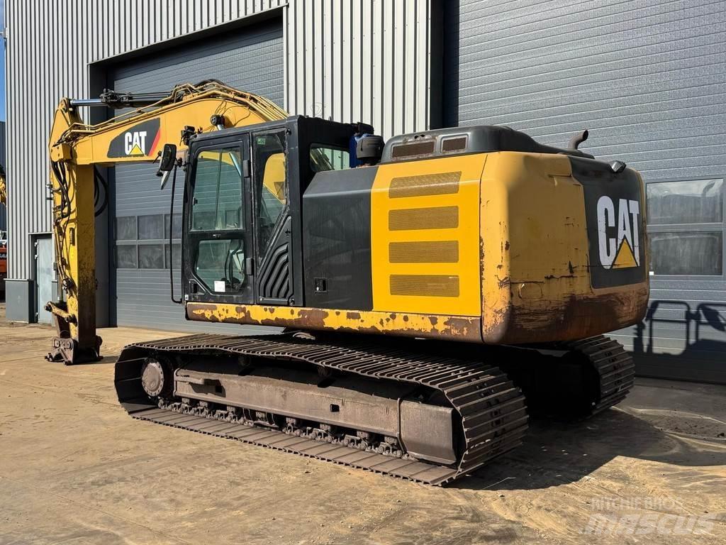 CAT 323EL Гусеничні екскаватори