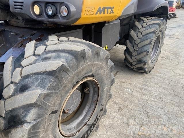 Mecalac 12 M TX Колісні екскаватори