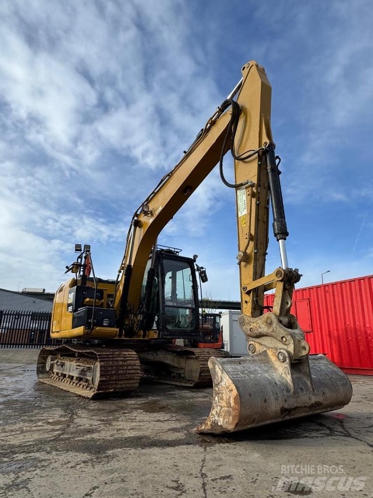 CAT 312 E Гусеничні екскаватори