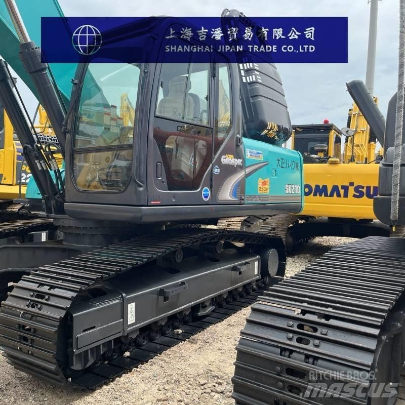 Kobelco SK 210 Гусеничні екскаватори