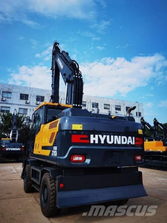 Hyundai 210W-9 Колісні екскаватори
