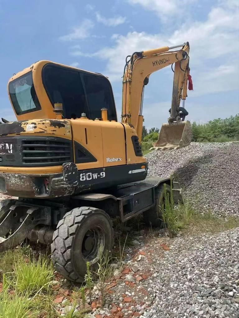 Hyundai 60W-9 Колісні екскаватори