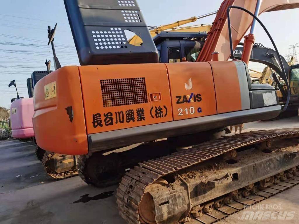 Hitachi ZX 210 Гусеничні екскаватори