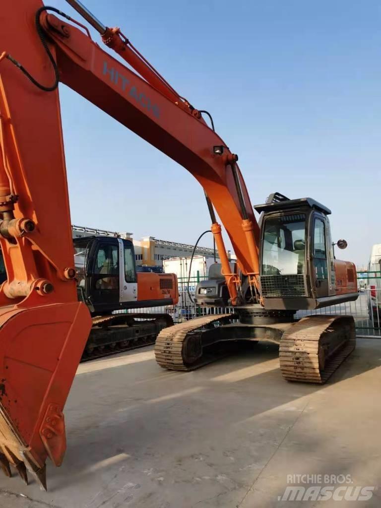 Hitachi ZX 210 Гусеничні екскаватори