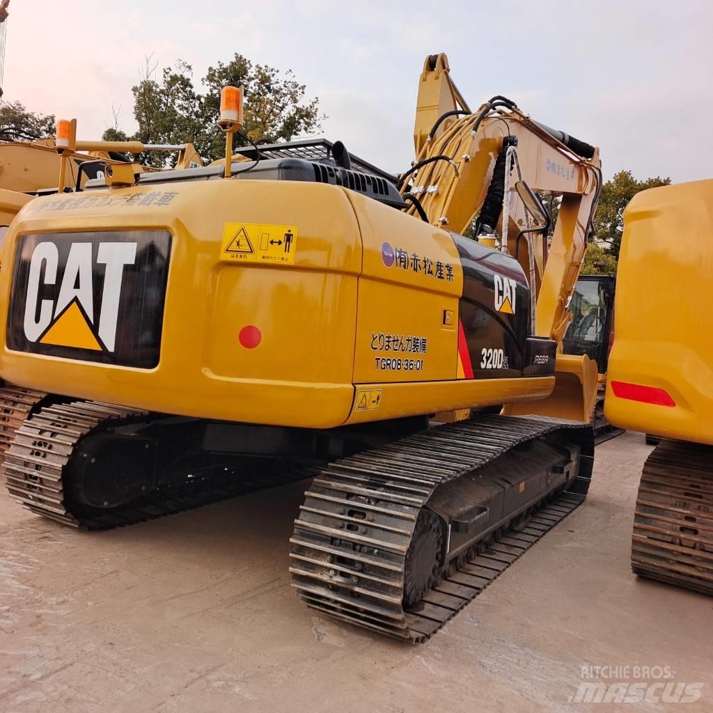 CAT 320DL Гусеничні екскаватори