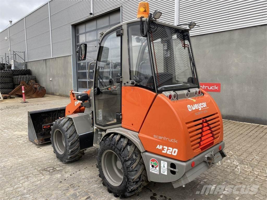 Weycor AR320 Cab Багатофункціональне обладнання для вантажних і землекопальних робіт