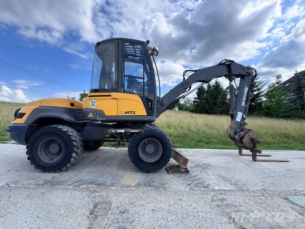Mecalac 12 MTX Екскаватори-навантажувачі