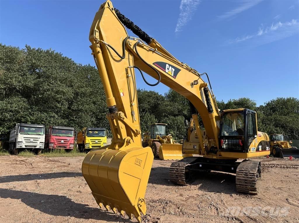 CAT 325 CL Гусеничні екскаватори