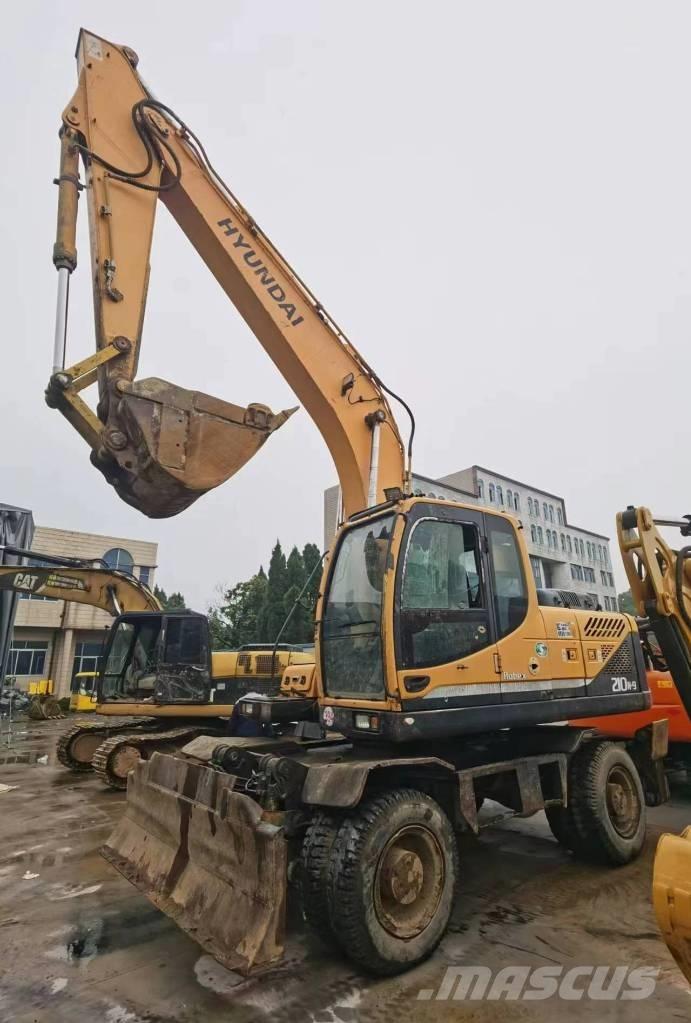 Hyundai R210W-9 Колісні екскаватори