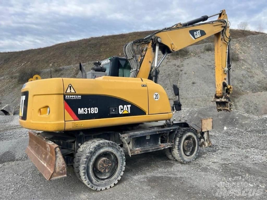 CAT M318D Колісні екскаватори