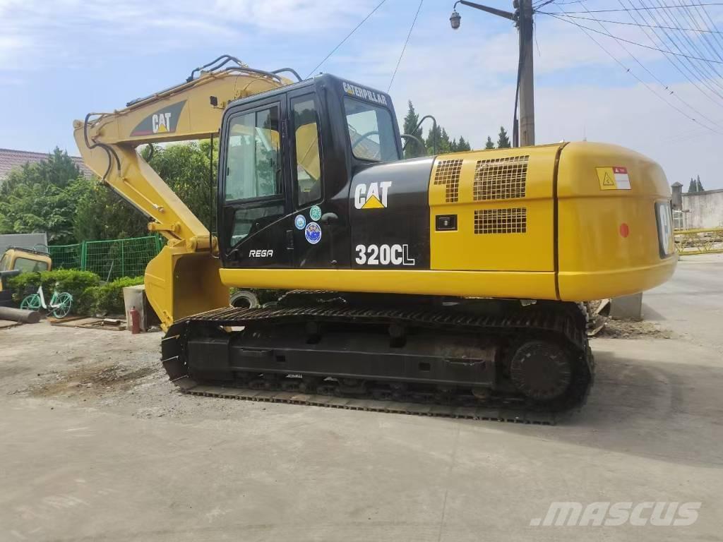 CAT 320 Гусеничні екскаватори