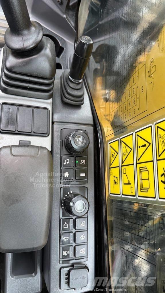 CAT 310 Гусеничні екскаватори