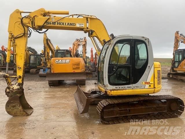 New Holland E 70 SR Середні екскаватори 7т. - 12т.