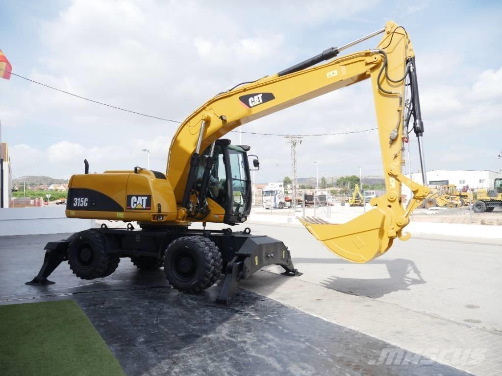 CAT M 315 C Колісні екскаватори