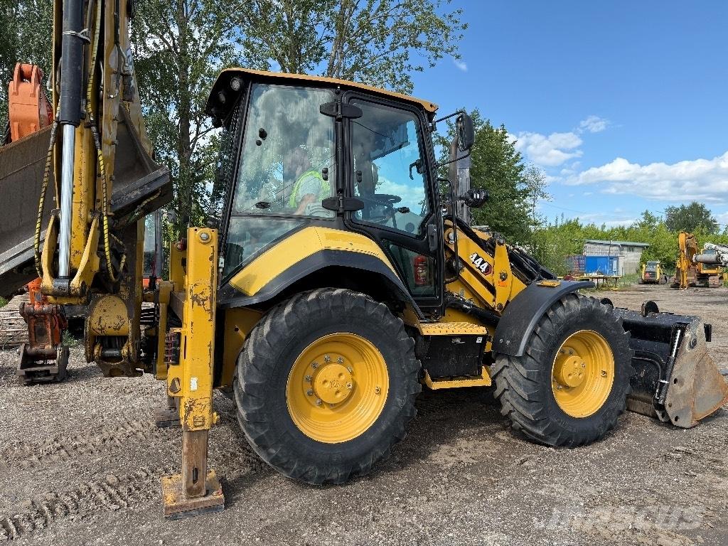 CAT 444 Екскаватори-навантажувачі