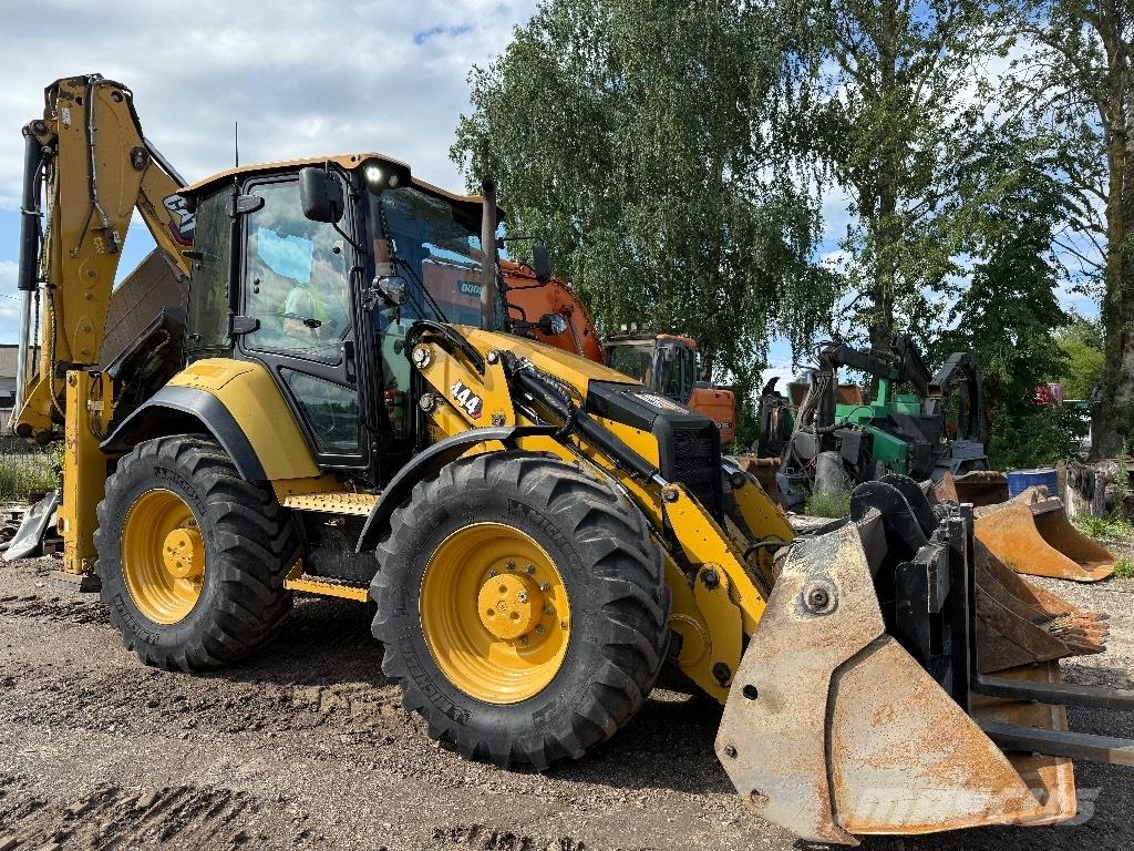CAT 444 Екскаватори-навантажувачі