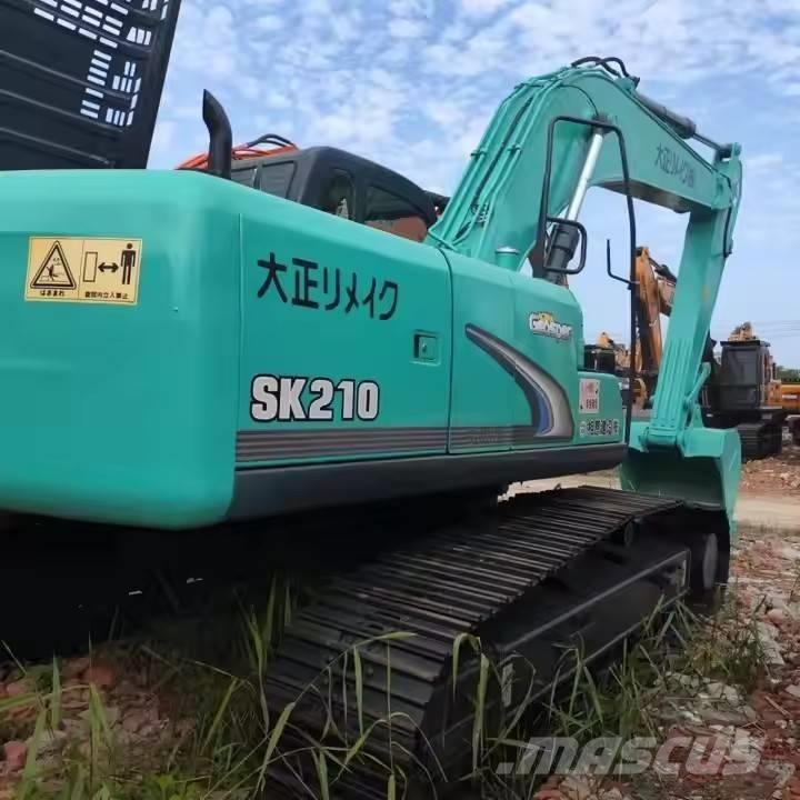 Kobelco SK 210 Гусеничні екскаватори