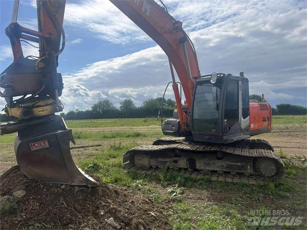 Hitachi ZX210 Гусеничні екскаватори