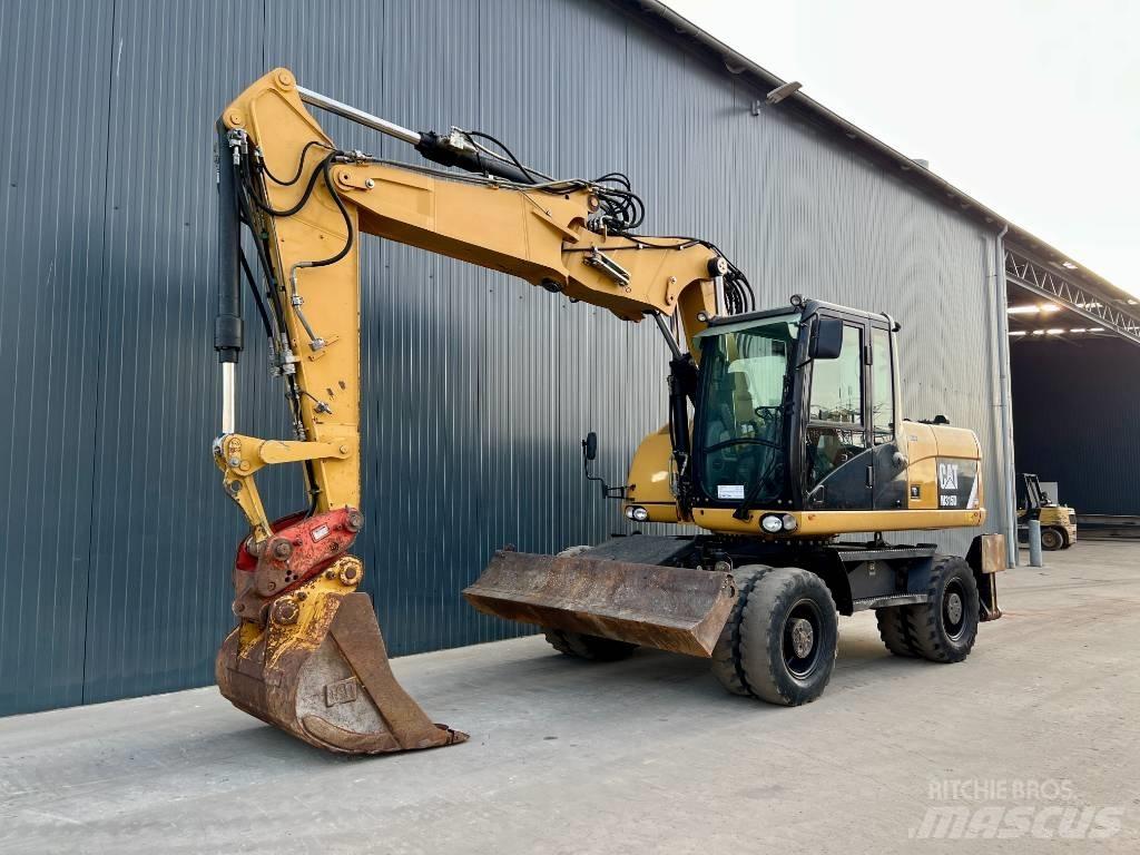 CAT M315D Колісні екскаватори