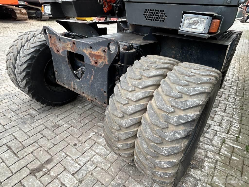Hitachi ZX 140 W Колісні екскаватори