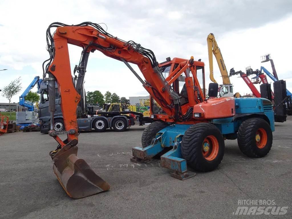 Mecalac 12MXT Колісні екскаватори