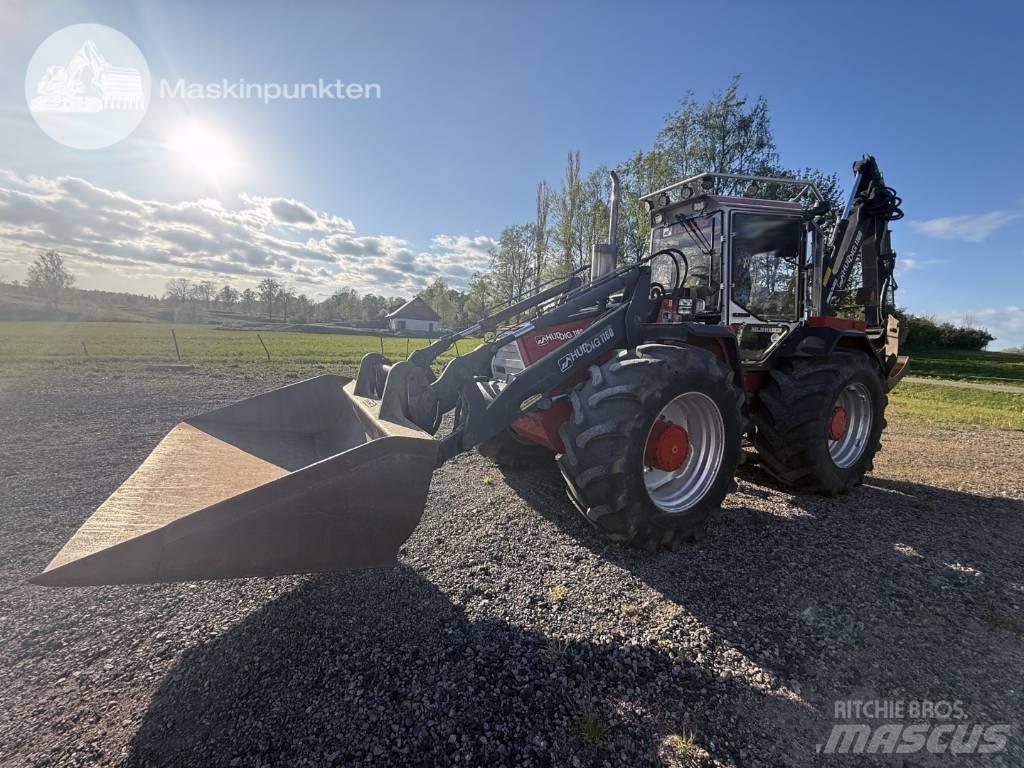 Huddig 1160 Екскаватори-навантажувачі