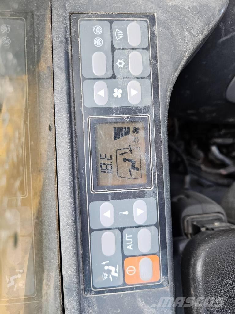 CAT 323 Гусеничні екскаватори