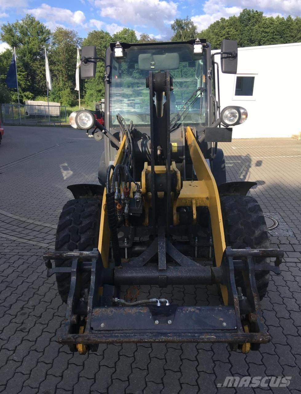 New Holland W50c Фронтальні навантажувачі