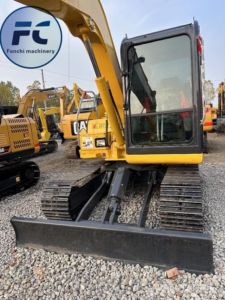 Komatsu 70 Гусеничні екскаватори