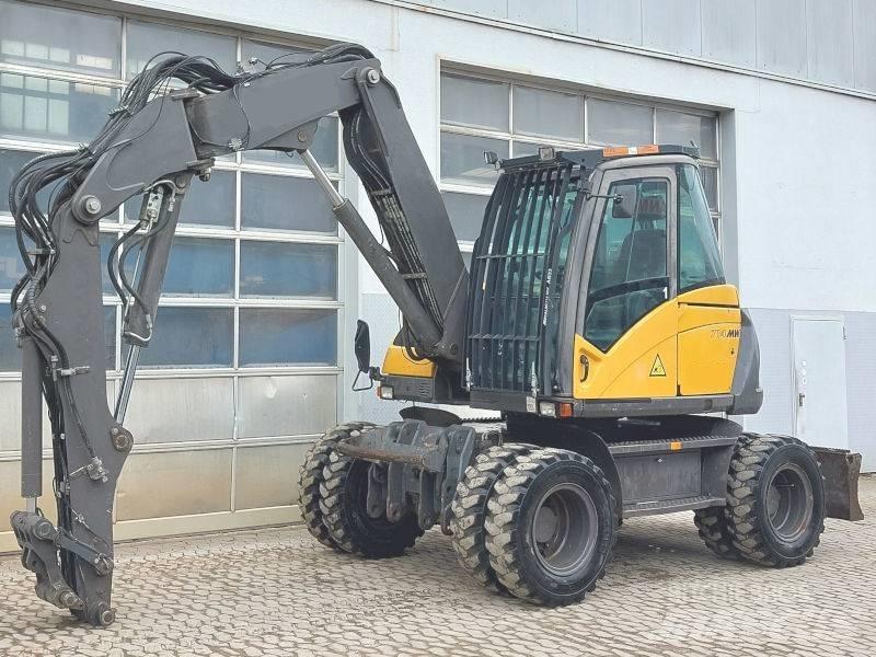 Mecalac 714 MW Колісні екскаватори