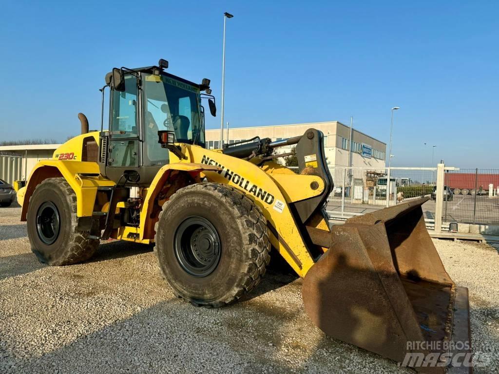 New Holland W 230 C Фронтальні навантажувачі