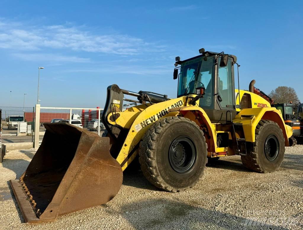 New Holland W 230 C Фронтальні навантажувачі